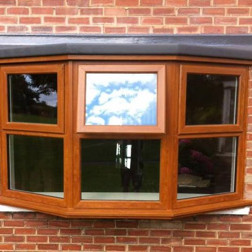 Bay window with wooden style frames.