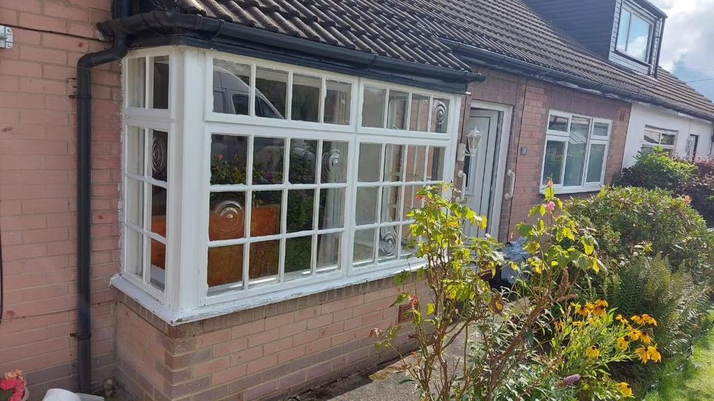 The front of a house with a bay window